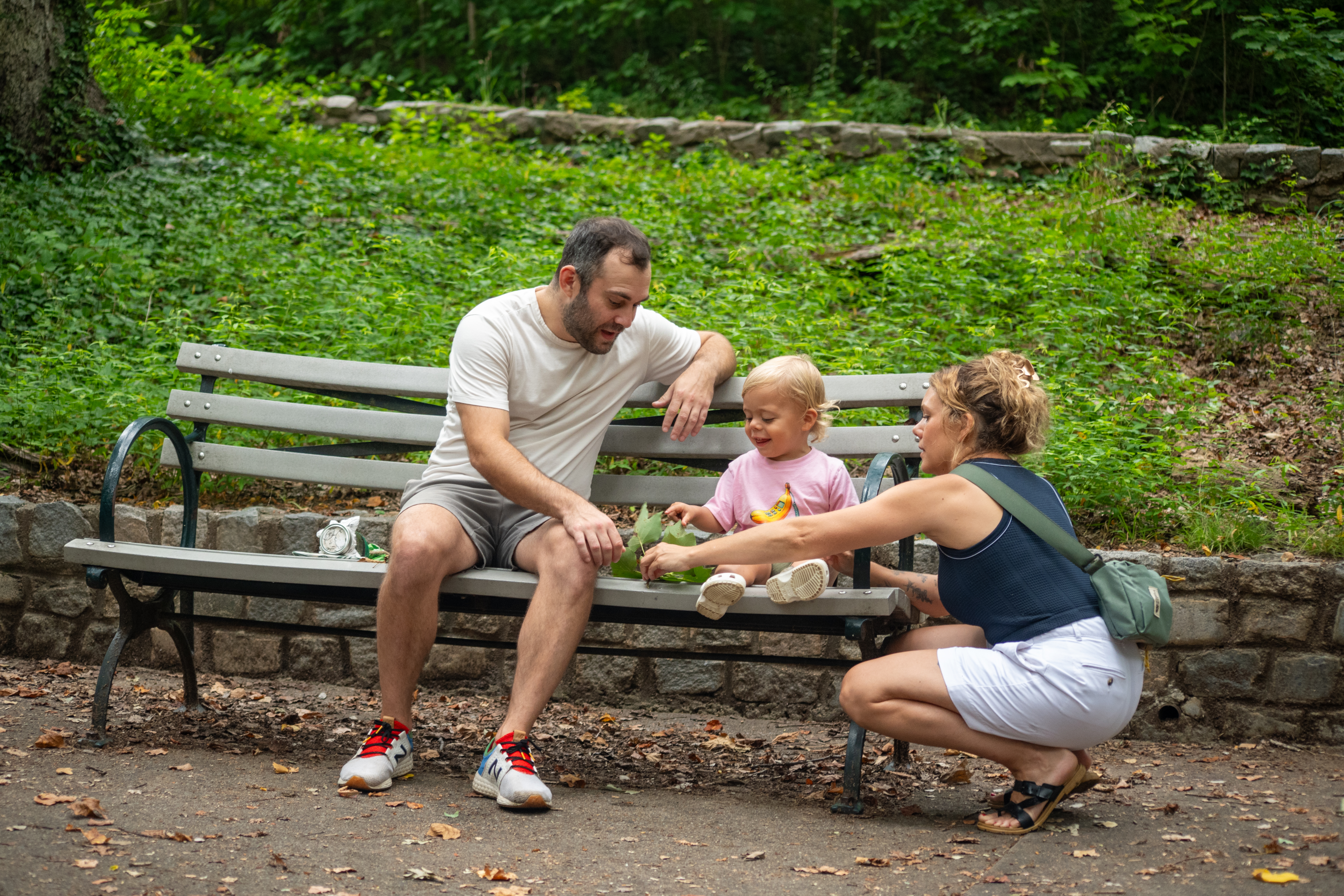 Theo Family - sitting on bench with leaf